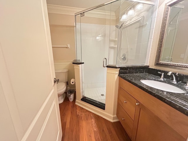 622 Seascape Way, Tampa, FL 33602 - full bathroom with toilet, wood finished floors, crown molding, a stall shower, and vanity
