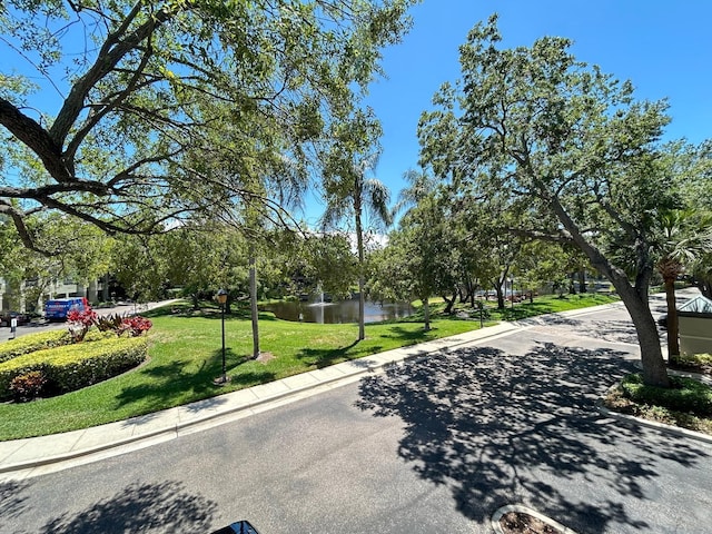 622 Seascape Way, Tampa, FL 33602 - view of asphalt street with a water view and curbs