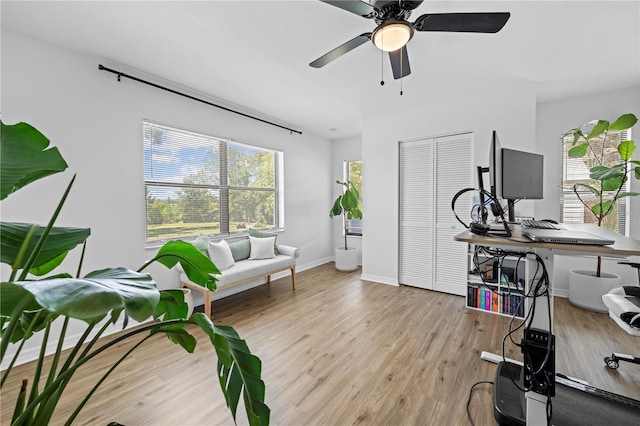 3041 Waterfall Dr, Spring Hill, FL 34608 - office area with light wood-type flooring, ceiling fan, and baseboards
