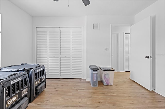 3041 Waterfall Dr, Spring Hill, FL 34608 - unfurnished bedroom featuring a closet, light wood-style floors, ceiling fan, and baseboards