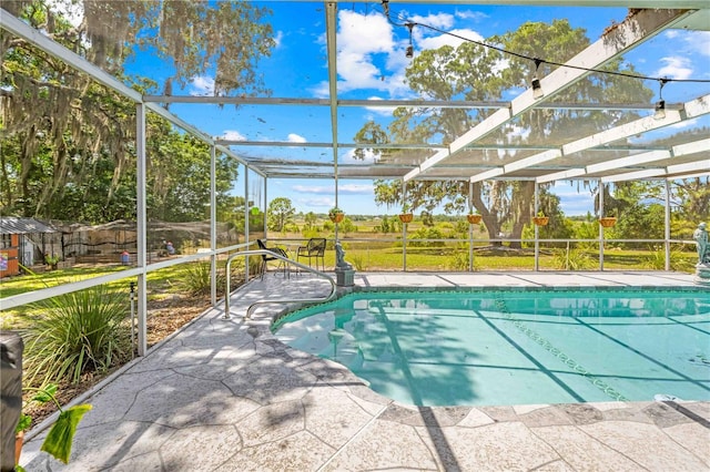 3041 Waterfall Dr, Spring Hill, FL 34608 - outdoor pool featuring a lanai and a patio