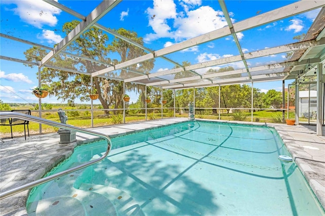 3041 Waterfall Dr, Spring Hill, FL 34608 - swimming pool featuring a lanai and a patio
