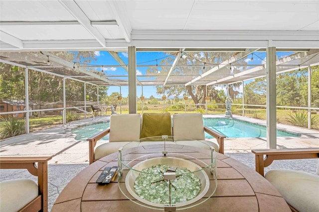 3041 Waterfall Dr, Spring Hill, FL 34608 - swimming pool featuring glass enclosure, a patio area, and outdoor dining area