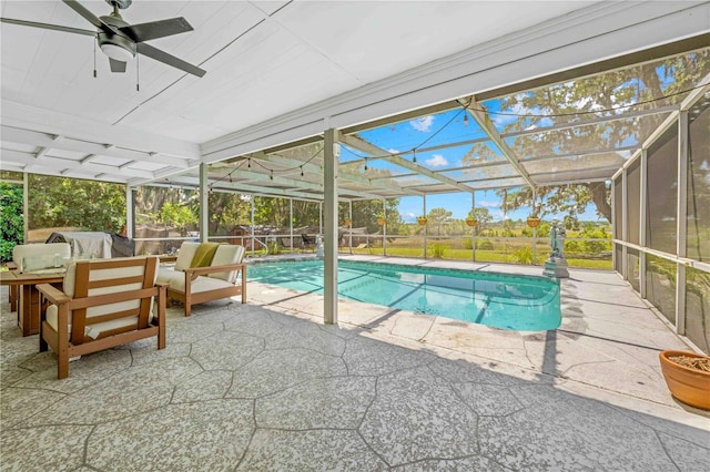 3041 Waterfall Dr, Spring Hill, FL 34608 - swimming pool with a patio, outdoor lounge area, a lanai, and a ceiling fan