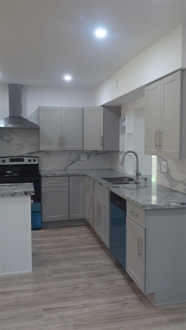 4824 Huntington St NE, Saint Petersburg, FL 33703 - kitchen featuring wall chimney range hood, a sink, stainless steel electric range, dishwashing machine, and light stone counters