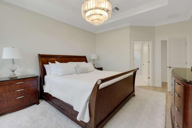 5410 Morey Farms Loop, Palmetto, FL 34221 - bedroom featuring crown molding, a raised ceiling, and a chandelier