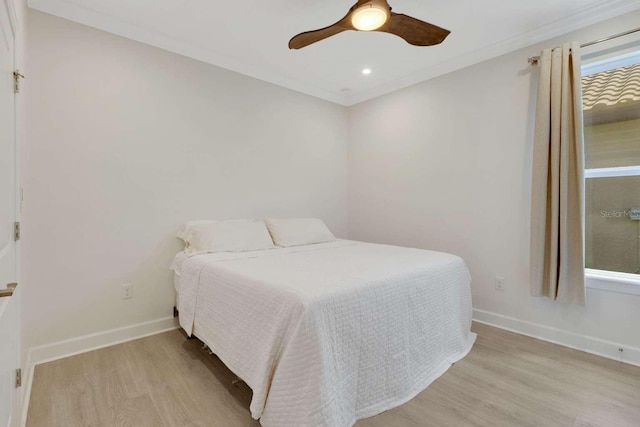 5410 Morey Farms Loop, Palmetto, FL 34221 - bedroom featuring light wood-style flooring, baseboards, crown molding, a ceiling fan, and recessed lighting