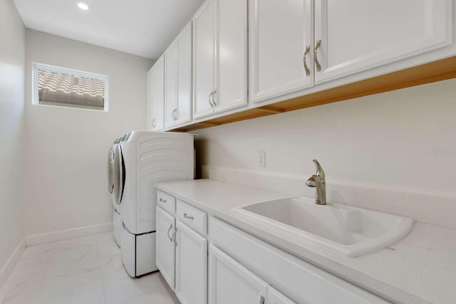 5410 Morey Farms Loop, Palmetto, FL 34221 - laundry room with cabinet space, light marble finish floors, independent washer and dryer, recessed lighting, and baseboards