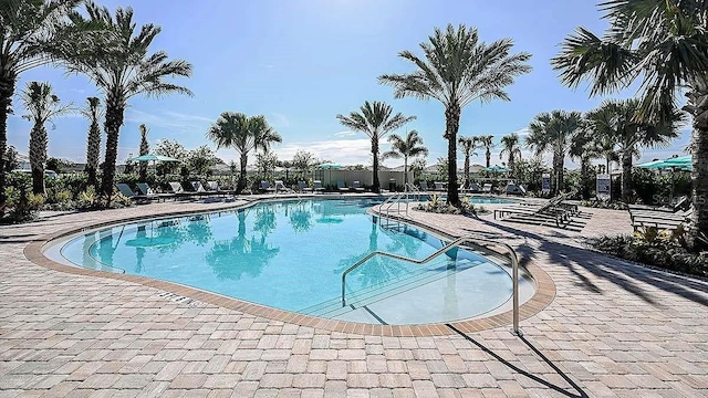 5410 Morey Farms Loop, Palmetto, FL 34221 - community pool featuring a patio area