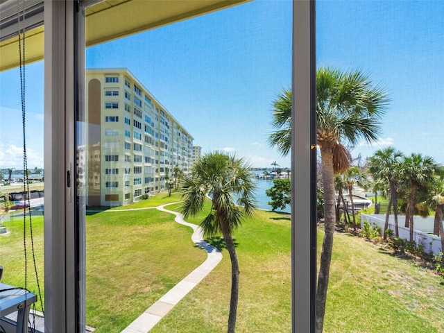 4700 Cove Cir Unit 301, Saint Petersburg, FL 33708 - view of home's community with a water view and a yard