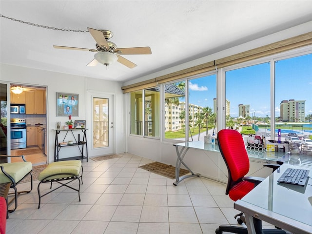 4700 Cove Cir Unit 301, Saint Petersburg, FL 33708 - office area featuring a city view, a ceiling fan, and light tile patterned floors