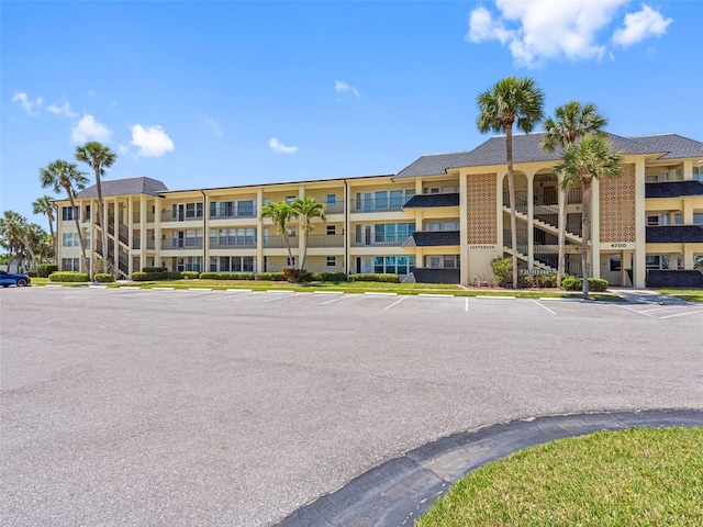 4700 Cove Cir Unit 301, Saint Petersburg, FL 33708 - view of apartment building / complex with uncovered parking
