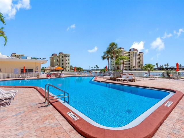 4700 Cove Cir Unit 301, Saint Petersburg, FL 33708 - community pool with a patio