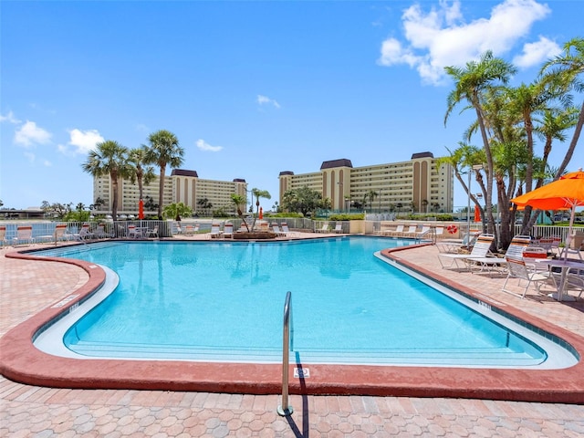4700 Cove Cir Unit 301, Saint Petersburg, FL 33708 - community pool with a patio area