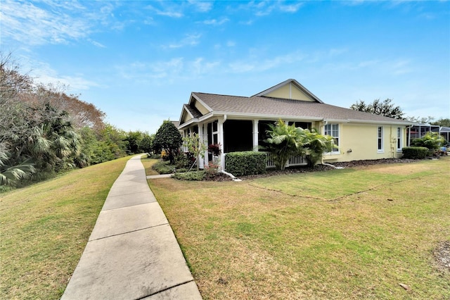 view of property exterior with a yard