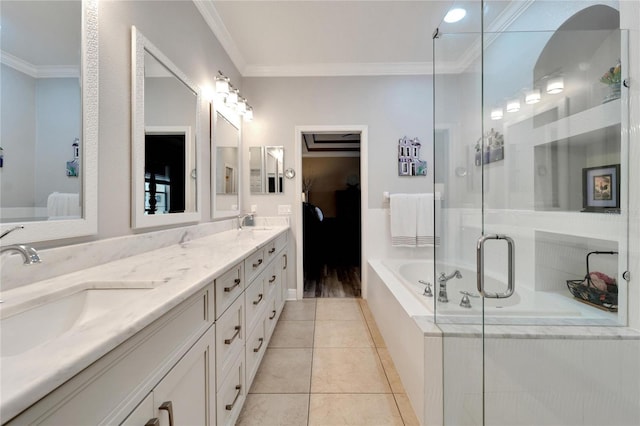 bathroom with ornamental molding, double vanity, a bath, a shower stall, and tile patterned floors