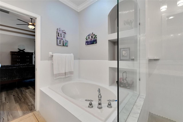 ensuite bathroom with crown molding, a bath, a ceiling fan, and walk in shower