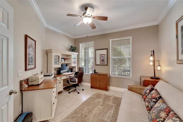 office area with ceiling fan, crown molding, light tile patterned floors, and baseboards