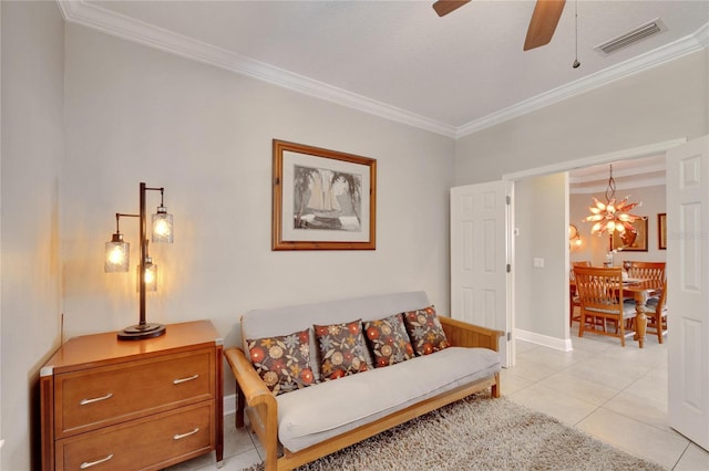 sitting room with ornamental molding, ceiling fan, a chandelier, light tile patterned flooring, and baseboards