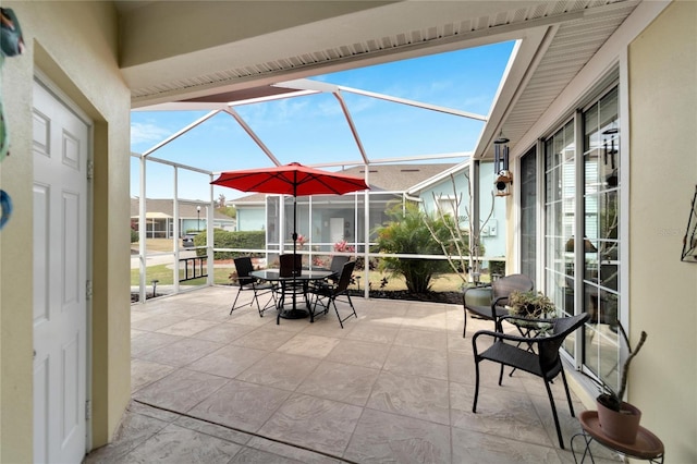 view of patio / terrace with glass enclosure
