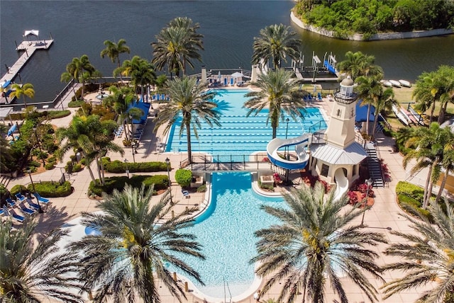 community pool featuring a water view