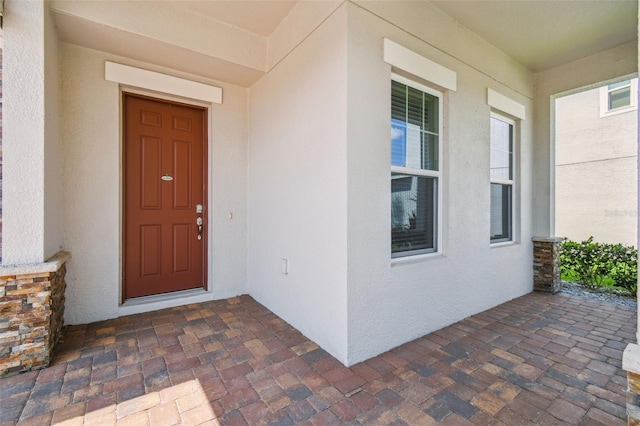 4950 Chase Ct, Saint Cloud, FL 34772 - doorway to property with stucco siding