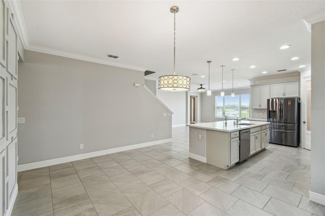 4950 Chase Ct, Saint Cloud, FL 34772 - kitchen featuring stainless steel appliances, a sink, ornamental molding, light countertops, and recessed lighting