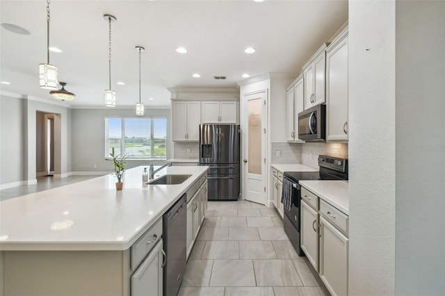 4950 Chase Ct, Saint Cloud, FL 34772 - kitchen with appliances with stainless steel finishes, a sink, decorative backsplash, ornamental molding, and recessed lighting