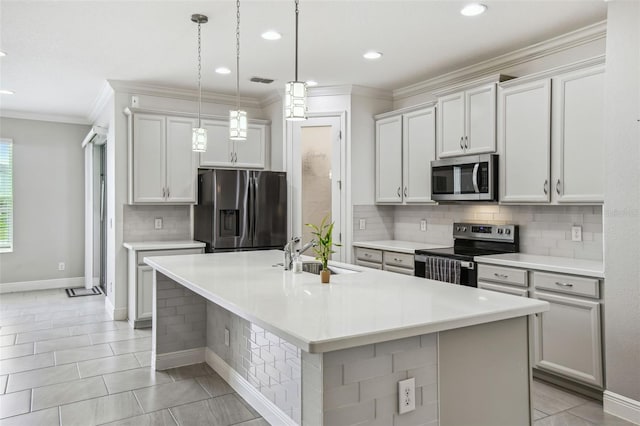 4950 Chase Ct, Saint Cloud, FL 34772 - kitchen with stainless steel appliances, a sink, baseboards, light countertops, and ornamental molding