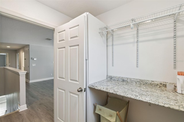 4950 Chase Ct, Saint Cloud, FL 34772 - spacious closet featuring dark wood-style floors