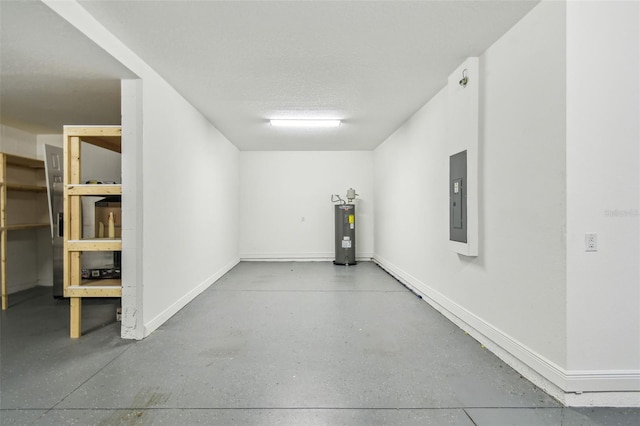 4950 Chase Ct, Saint Cloud, FL 34772 - garage featuring water heater, electric panel, and baseboards