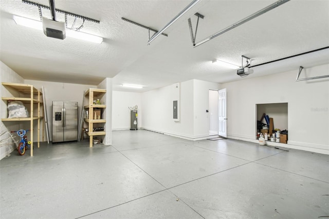 4950 Chase Ct, Saint Cloud, FL 34772 - garage with stainless steel refrigerator with ice dispenser, electric water heater, a garage door opener, and electric panel