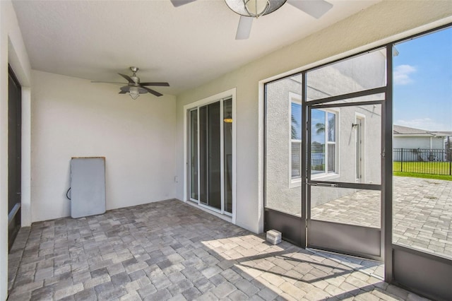 4950 Chase Ct, Saint Cloud, FL 34772 - unfurnished sunroom featuring a ceiling fan