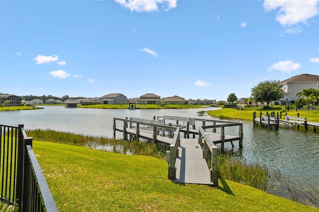 4950 Chase Ct, Saint Cloud, FL 34772 - dock area featuring a yard, a water view, and a residential view