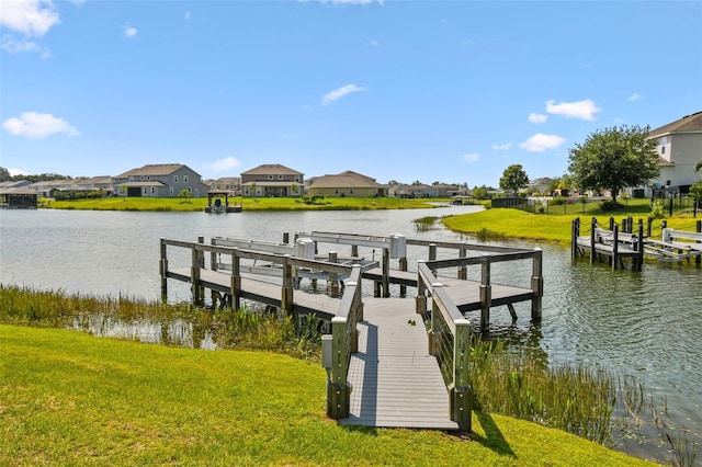 4950 Chase Ct, Saint Cloud, FL 34772 - dock area featuring a residential view, a lawn, and a water view