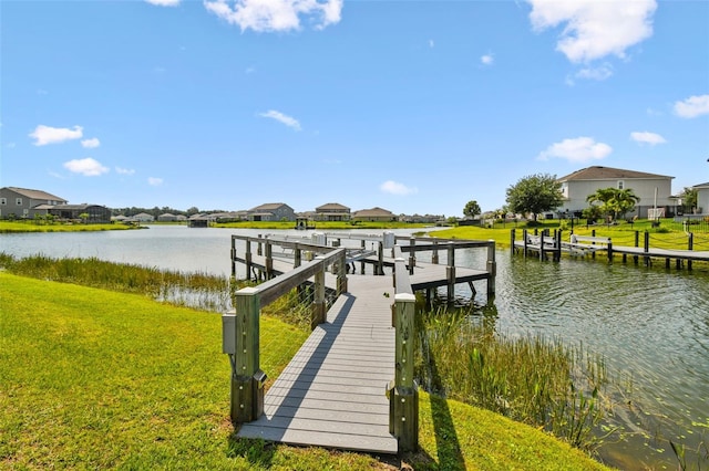 4950 Chase Ct, Saint Cloud, FL 34772 - dock area featuring a lawn, a water view, and a residential view