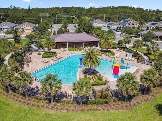 4950 Chase Ct, Saint Cloud, FL 34772 - community pool with a patio area and a forest view