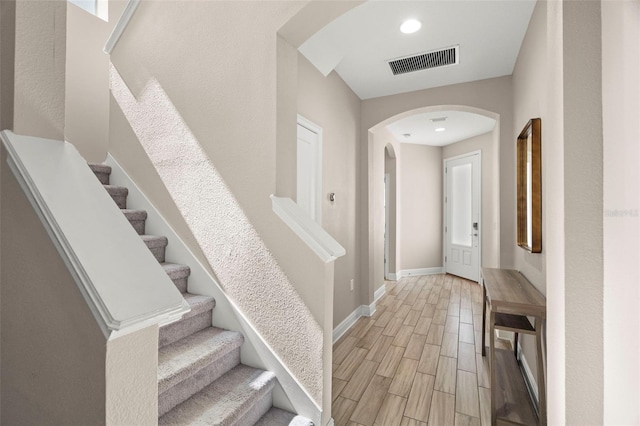 1520 W Fig St, Tampa, FL 33606 - entryway featuring arched walkways, wood tiled floors, and baseboards