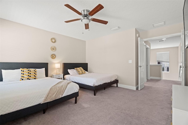 1520 W Fig St, Tampa, FL 33606 - carpeted bedroom with ceiling fan and baseboards