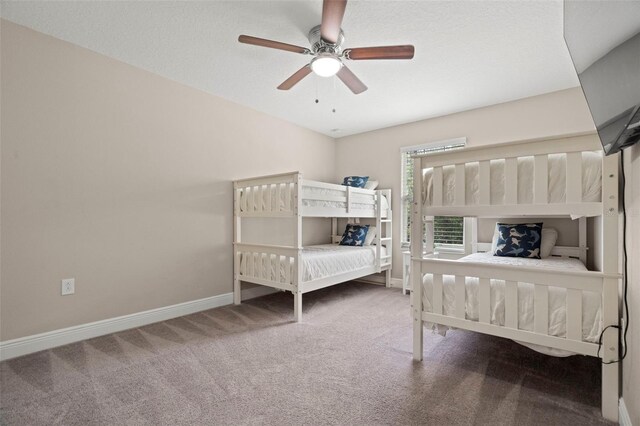 1520 W Fig St, Tampa, FL 33606 - carpeted bedroom featuring baseboards and ceiling fan