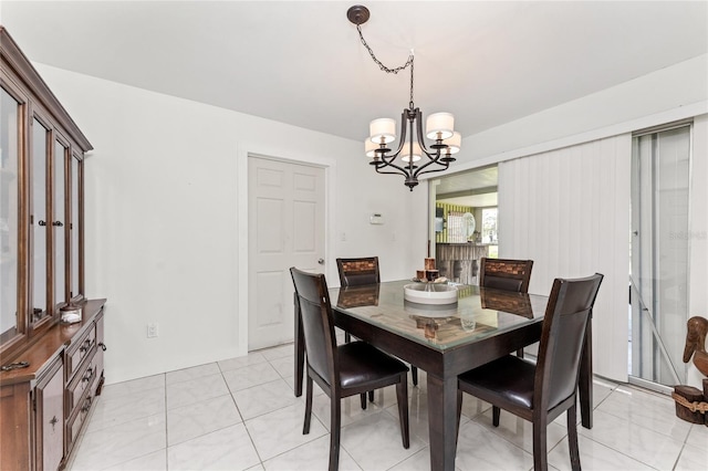 3420 Santa Clara Dr, Punta Gorda, FL 33983 - dining area featuring a chandelier and light tile patterned floors