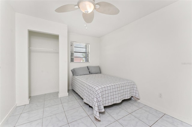 3420 Santa Clara Dr, Punta Gorda, FL 33983 - bedroom with baseboards, a ceiling fan, and light tile patterned flooring