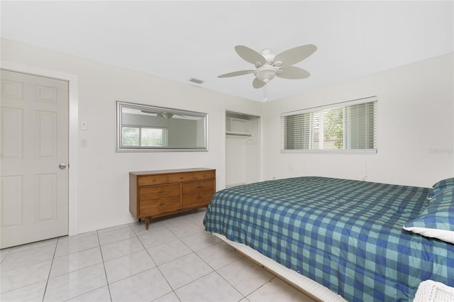 3420 Santa Clara Dr, Punta Gorda, FL 33983 - bedroom featuring light tile patterned floors, a closet, a ceiling fan, and baseboards