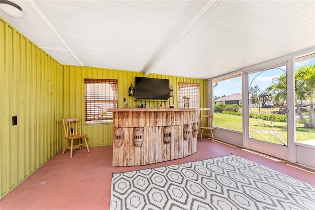 3420 Santa Clara Dr, Punta Gorda, FL 33983 - sunroom featuring carpet, healthy amount of natural light, and wooden walls