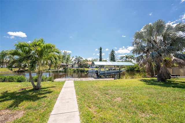 3420 Santa Clara Dr, Punta Gorda, FL 33983 - view of home's community with a water view, boat lift, a boat dock, and a lawn