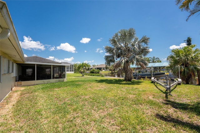 3420 Santa Clara Dr, Punta Gorda, FL 33983 - view of green lawn with a sunroom