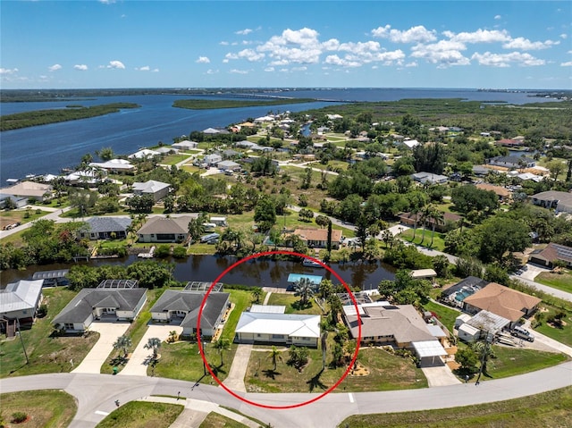 3420 Santa Clara Dr, Punta Gorda, FL 33983 - aerial perspective of suburban area with a nearby body of water