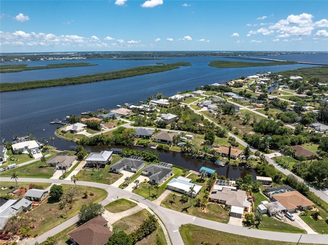3420 Santa Clara Dr, Punta Gorda, FL 33983 - aerial perspective of suburban area with a large body of water and a notable bridge