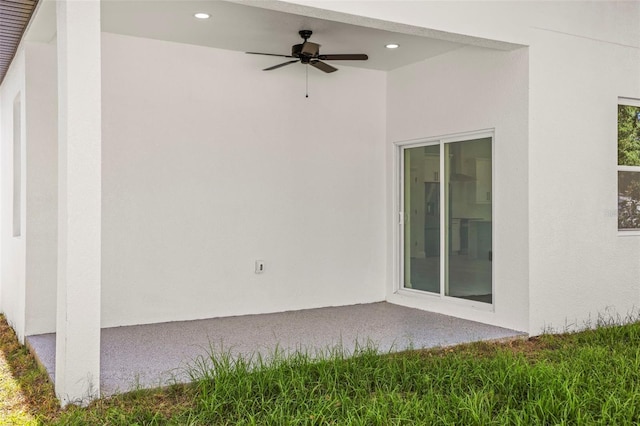 view of patio featuring a ceiling fan