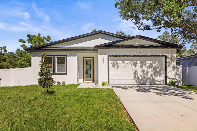 view of front facade featuring an attached garage, concrete driveway, and board and batten siding